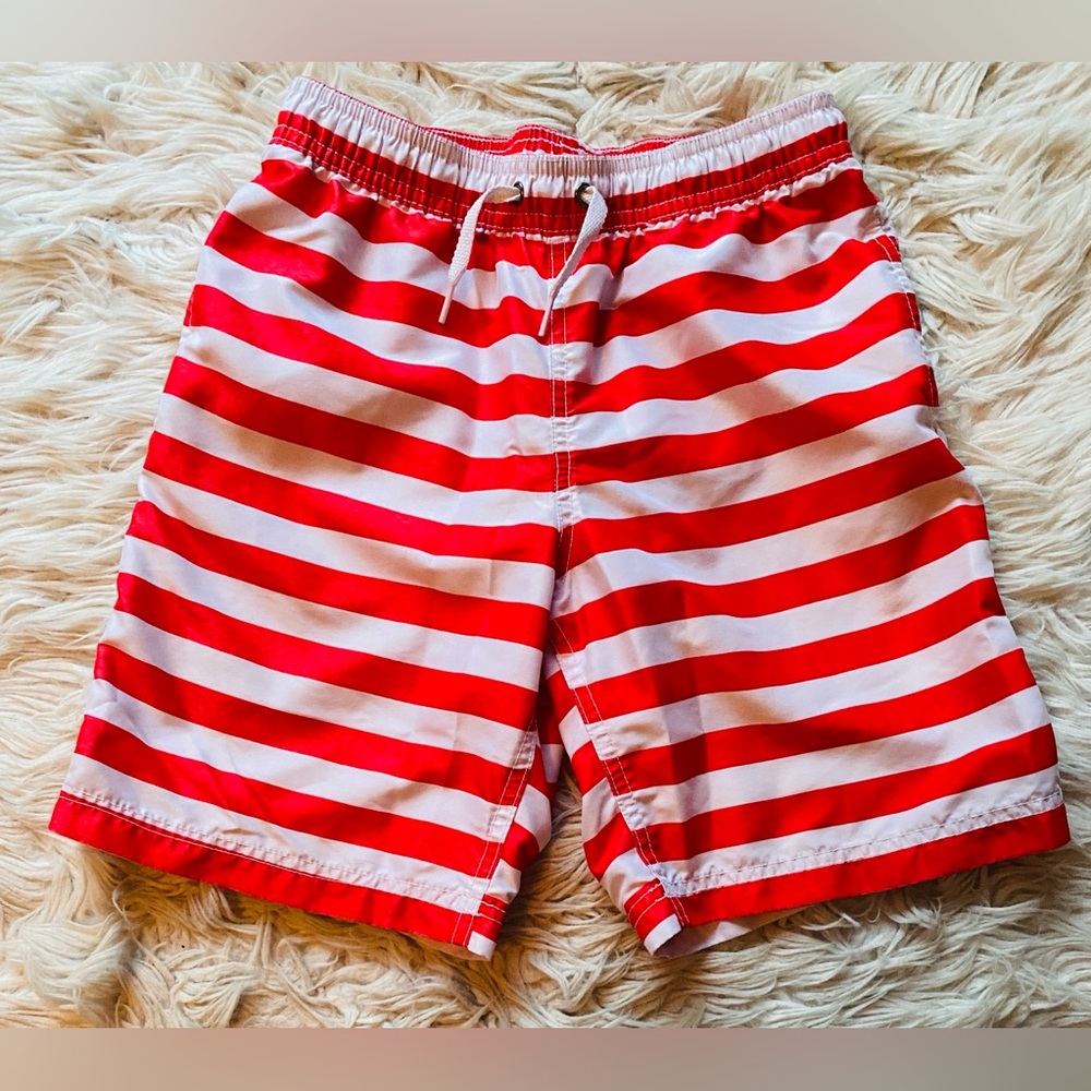 Hanna Andersson size 10 swim trunks.  No issues.